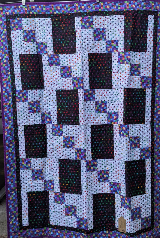 Purple puppy paw print throw quilt