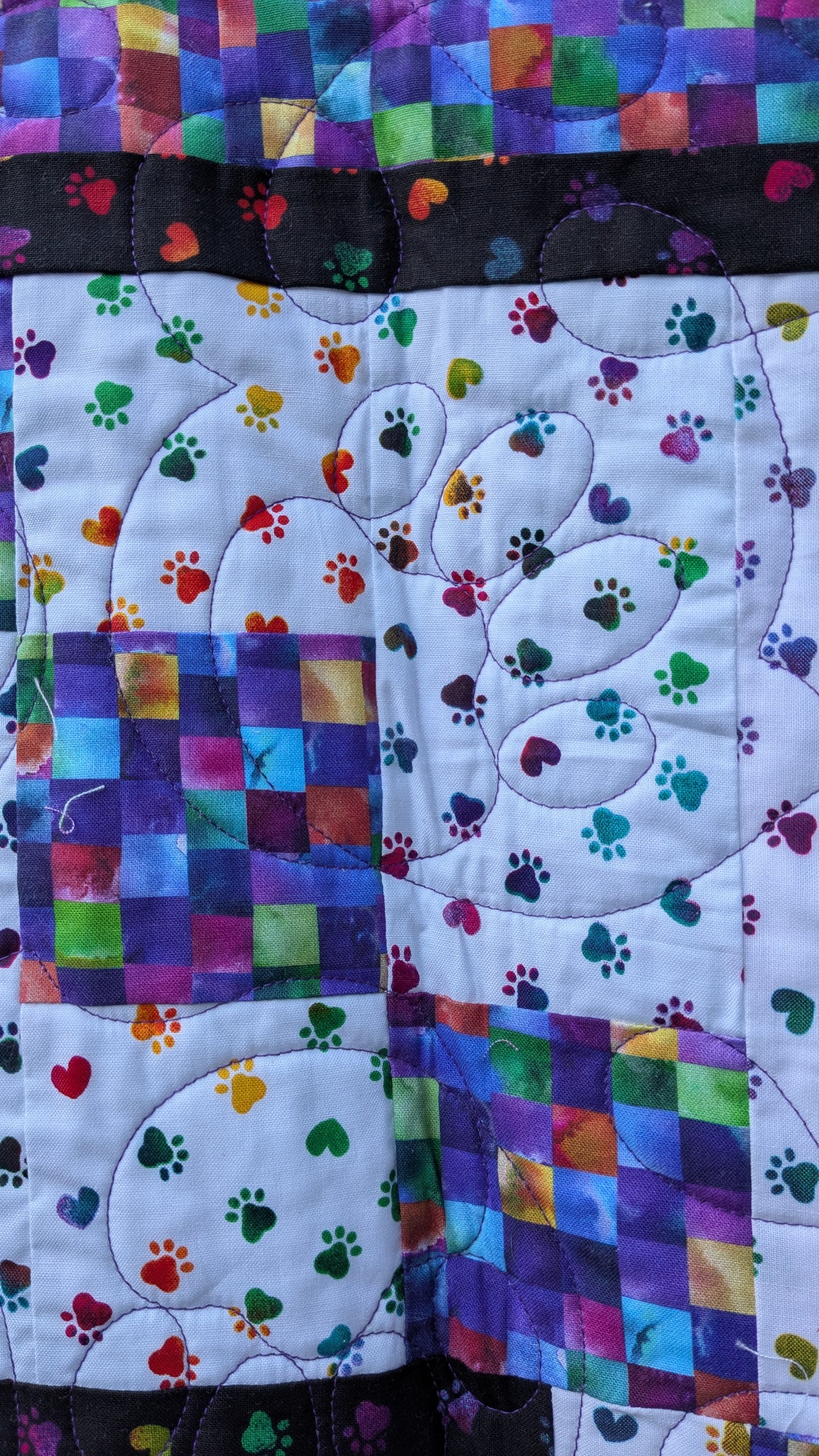 Purple puppy paw print throw quilt